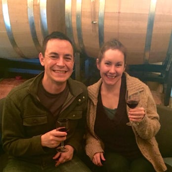 Stina's Cellars - a man and a woman holding wine glasses - Beer, Wine & Spirits Near Me - Lakewood, Washington Stina's Cellars - a man and a woman holding wine glasses - Beer, Wine & Spirits Near Me - Lakewood, Washington
