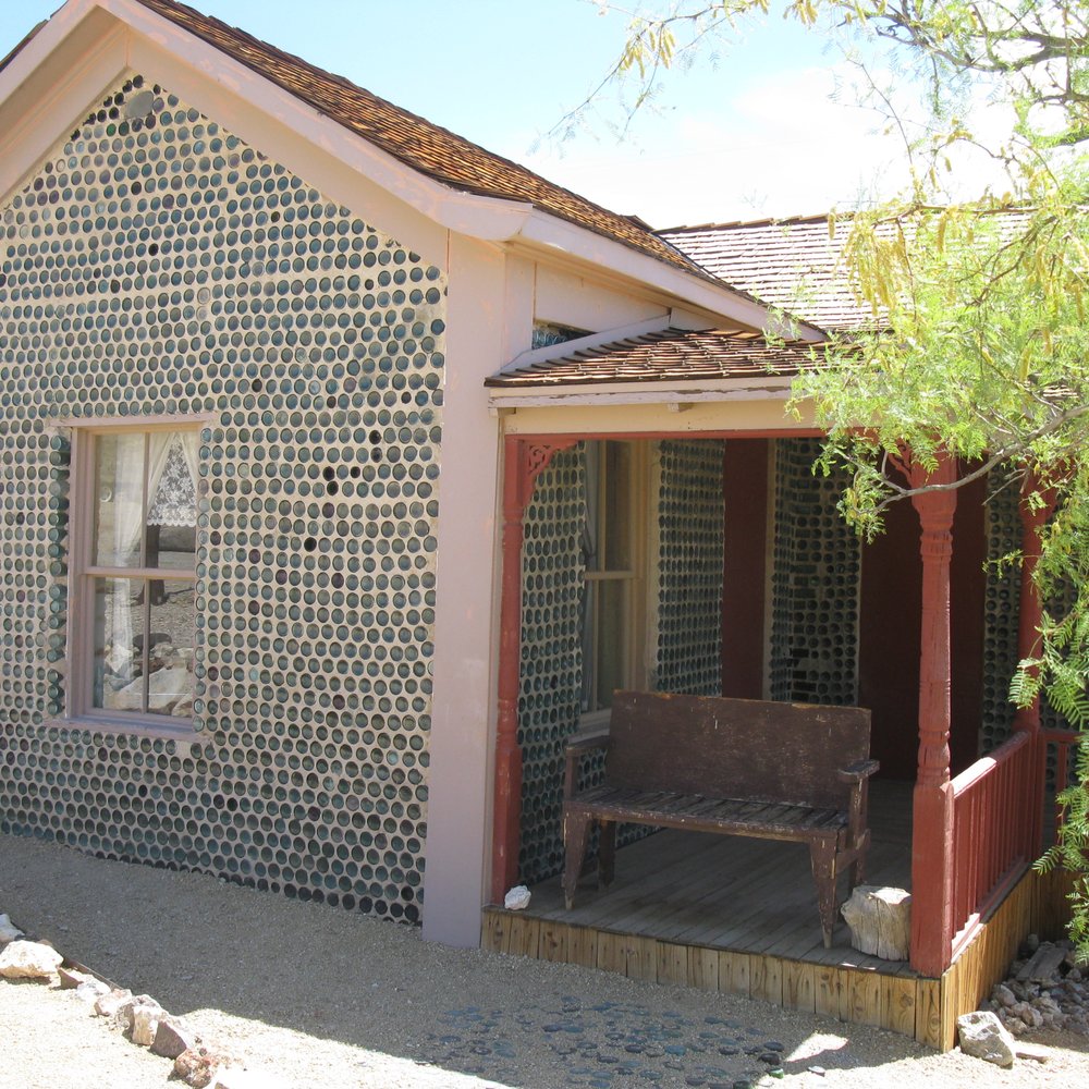 Rhyolite Ghost Town - 05.27.13 Tom Kelly Bottle House - built the bottle house out of 5,000 beer and liquor bottles - Landmarks & Historical Buildings Near Me - Beatty, Nevada Rhyolite Ghost Town - 05.27.13 Tom Kelly Bottle House - built the bottle house out of 5,000 beer and liquor bottles - Landmarks & Historical Buildings Near Me - Beatty, Nevada