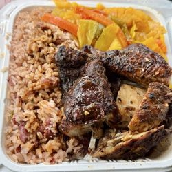 Paradise Jamaican Cuisine - Jerk chicken with rice & peas and cabbage.