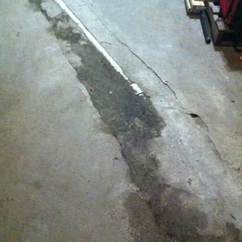 McGough Plumbing - Barely covered PVC pipe, and damp concrete floor. - Plumbing Near Me - Lynn, Massachusetts McGough Plumbing - Barely covered PVC pipe, and damp concrete floor. - Plumbing Near Me - Lynn, Massachusetts