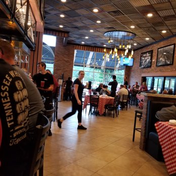 Grimaldi's - View of entrance to restaurant from the vantage point of the back of the restaurant. - Pizza Near Me - Huntsville, Alabama