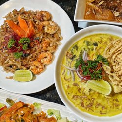 Delicious spread. Pad Thai, massaman curry, khao soi
