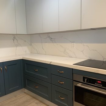 Art And Smart - a kitchen with marble counter tops - General Contractors Near Me - San Diego, California