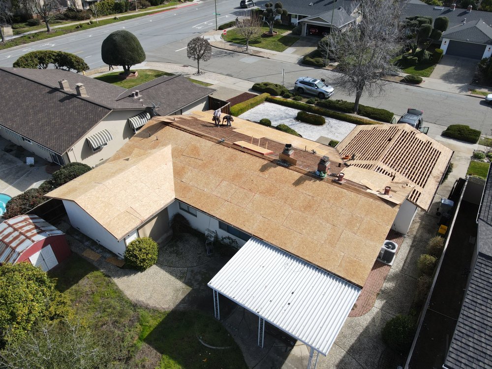 Slide of ELM Roofing Contractors