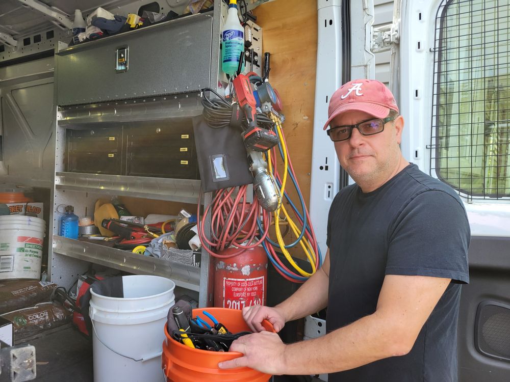 Slide of JD The Handyman