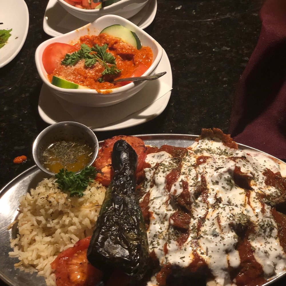 Aya Sofia - Iskender vertically grilled and thinly sliced beef and lamb, served over pita with tomato sauce and yogurt (H) - Turkish Near Me - Saint Louis, Missouri Aya Sofia - Iskender vertically grilled and thinly sliced beef and lamb, served over pita with tomato sauce and yogurt (H) - Turkish Near Me - Saint Louis, Missouri
