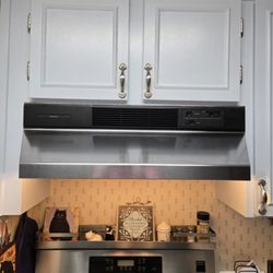 Danva Appliance Repair - Old range hood and stove the had to be removed
