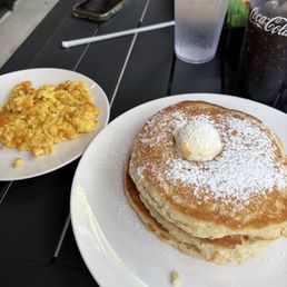 Sweet cream pancakes with a side of eggs