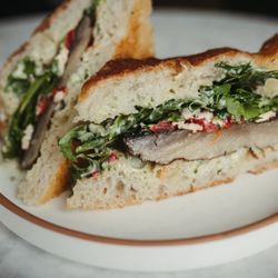 The Hive Coffee & Cafe - Roasted portobello mushroom sandwich with feta, roasted red peppers, arugula, and basil aioli