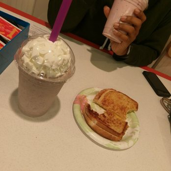 Chill...The Milkshake Bar - My shake cookies and cream and vanilla with brownie bites. Idk what she has in the back lol - Ice Cream & Frozen Yogurt Near Me - Spring, Texas Chill...The Milkshake Bar - My shake cookies and cream and vanilla with brownie bites. Idk what she has in the back lol - Ice Cream & Frozen Yogurt Near Me - Spring, Texas