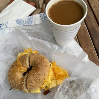 Spread Bagelry - The Standard with eggs, smoked bacon, and smoked cheddar subbed for the Cooper sharp it normally comes with - A-MAZING. Large drip coffee. - Coffee & Tea Near Me - Mt. Pleasant, South Carolina Spread Bagelry - The Standard with eggs, smoked bacon, and smoked cheddar subbed for the Cooper sharp it normally comes with - A-MAZING. Large drip coffee. - Coffee & Tea Near Me - Mt. Pleasant, South Carolina