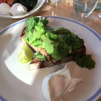Granger & Co - Toasted rye with avocado, lime, coriander and poached egg at £8.75 - Australian Near Me - London, XGL