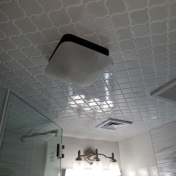 Top NYC Builders - a bathroom with a ceiling fan - General Contractors Near Me Top NYC Builders - a bathroom with a ceiling fan - General Contractors Near Me