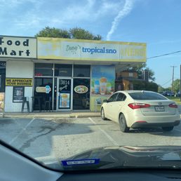 a car parked in front of a store