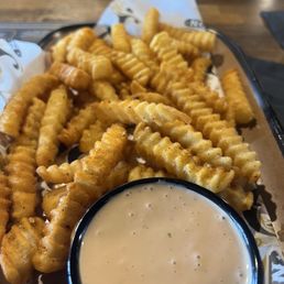 The side order of fries.