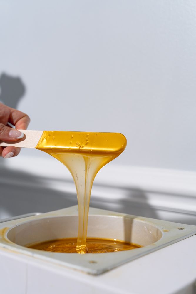 Fifth Avenue Wax Center and Spa Logo