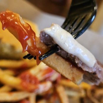 Mission BBQ - A display of a fork and delicious food. - Barbeque Near Me - Roanoke, Virginia
