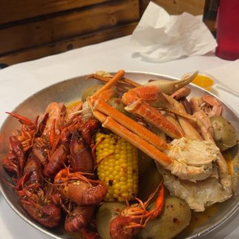 Juicy Tails - Rogers - Crawfish, Snow Crab(1lb), shrimp, sausage, corn, and potatoes - Seafood Near Me - Rogers, Arkansas Juicy Tails - Rogers - Crawfish, Snow Crab(1lb), shrimp, sausage, corn, and potatoes - Seafood Near Me - Rogers, Arkansas