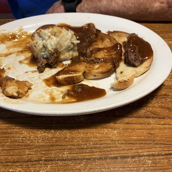 Clockers Cafe - The open faced hot beef sandwich  had a decent flavor but the quote "Where's the beef?" would definitely apply!!! It was pretty sparse. - American Near Me - Branson, Missouri