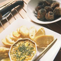 Potato beignets and baked crab dip Potato beignets and baked crab dip