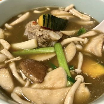 Hug Esan - Mushroom Soup with pork spare ribs - Thai Near Me - Elmhurst, New York Hug Esan - Mushroom Soup with pork spare ribs - Thai Near Me - Elmhurst, New York