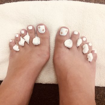 Kim's Nails - White base pedi with gold twinkle stars (I know I still have the napkin in, I just loved it so much I couldn't wait) - Nail Salons Near Me - Los Angeles, California Kim's Nails - White base pedi with gold twinkle stars (I know I still have the napkin in, I just loved it so much I couldn't wait) - Nail Salons Near Me - Los Angeles, California
