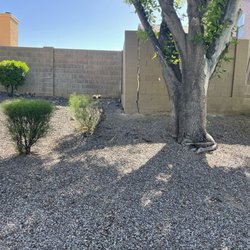 Legacy Contracting - Existing cracked wall corner, exposed footing and broken iron fence.