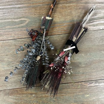 The Witchery - Two small brooms - Performing Arts Near Me - Salem, Massachusetts