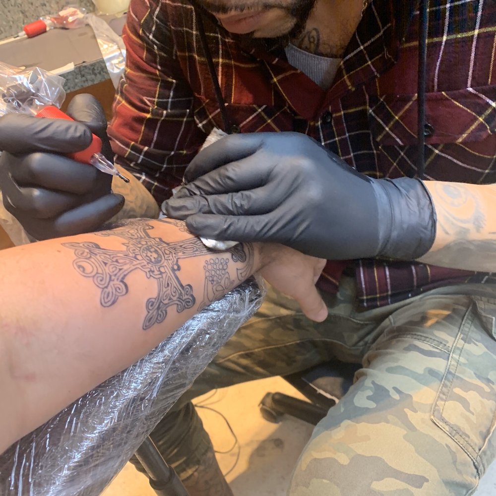 Peacock's Tattoo - Eli working on his craft - Tattoo Near Me - Jacksonville, Florida Peacock's Tattoo - Eli working on his craft - Tattoo Near Me - Jacksonville, Florida