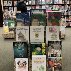Miyazaki books with MoMA highlights behind!