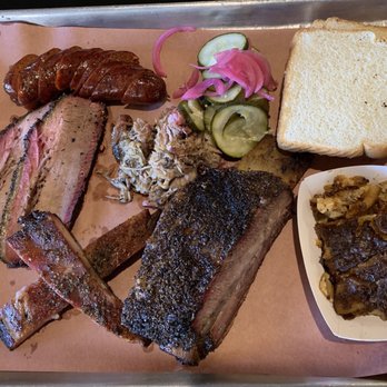 Interstellar BBQ - Lean brisket, pork spare ribs, pulled pork, beef rib, brisket sausage and smoked scalloped potatoes - Barbeque Near Me - Austin, Texas