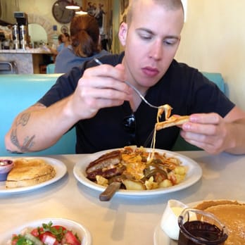 Village Cafe - He is digging in - American Near Me - Long Beach, California Village Cafe - He is digging in - American Near Me - Long Beach, California
