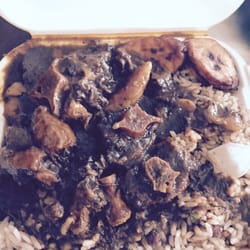 Jerk Masters - Delicious oxtails with rice and beans.