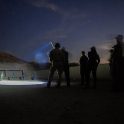 International Tactical Training Seminars - Low-light training on steel targets practicing independent flashlight techniques.