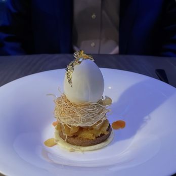 Peak with Priceless Restaurant & Bar - The egg; Calamansi, roasted pineapple, almond cream - New American Near Me - New York, New York Peak with Priceless Restaurant & Bar - The egg; Calamansi, roasted pineapple, almond cream - New American Near Me - New York, New York