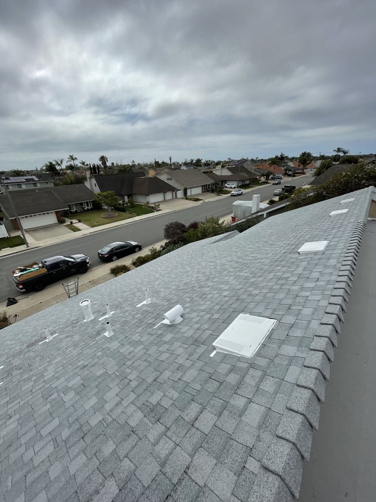 Slide of Baiza's Roofing