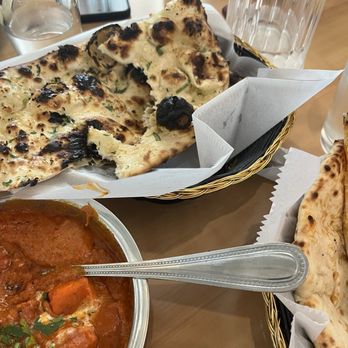 Naan Stopp - Garlic Naan, it was a bit overcooked. - Indian Near Me - Windermere, Florida