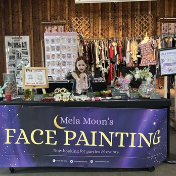 Mela Moon - Face painting at a market - Face Painting Near Me