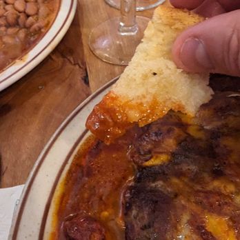 The Shed - You must dip garlic bread in red chile. You must. - New Mexican Cuisine Near Me - Santa Fe, New Mexico The Shed - You must dip garlic bread in red chile. You must. - New Mexican Cuisine Near Me - Santa Fe, New Mexico
