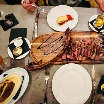 The Fort Steakhouse - Tomahawk with Lobster Tail, & Loaded Baked Potato. - Steakhouses Near Me - Fort Pierce, Florida The Fort Steakhouse - Tomahawk with Lobster Tail, & Loaded Baked Potato. - Steakhouses Near Me - Fort Pierce, Florida