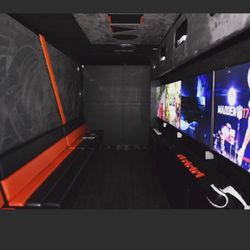 Hardwood floors, leather and suede interior limo style seating LED and all 4K Tvs the up to date Gaming truck in Los angels