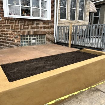 Lyons Family Construction - Retaining wall and patio - Masonry/Concrete Near Me