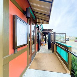 Exterior outside entrance of Googie Grill - Left door to the inside dining area, straight to the patio. - Seaside, California Exterior outside entrance of Googie Grill - Left door to the inside dining area, straight to the patio. - Seaside, California