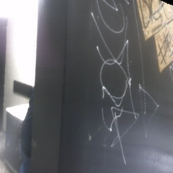 Butch Kowals - a bathroom with a blackboard on the wall - Bars Near Me - Rahway, New Jersey