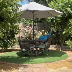 Sunshine Landscaping - The new artificial turf surrounded by slate border. Bravo Lazaro and Sunshine Landscaping