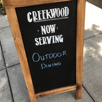Creekwood - Sandwich board outside Creekwood in Berkeley. - Italian Near Me - Berkeley, California
