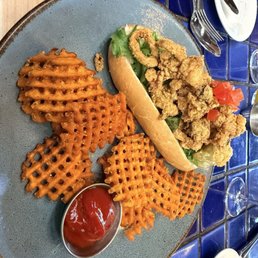 Seafood Po boy and sweet potato fries