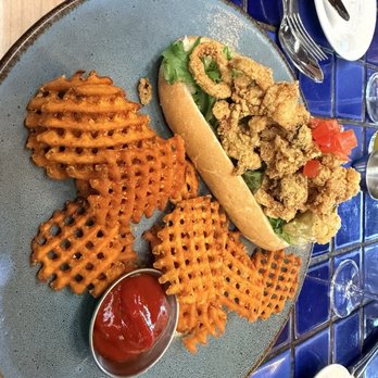 Cappy's Restaurant - Seafood Po boy and sweet potato fries - New American Near Me - San Antonio, Texas