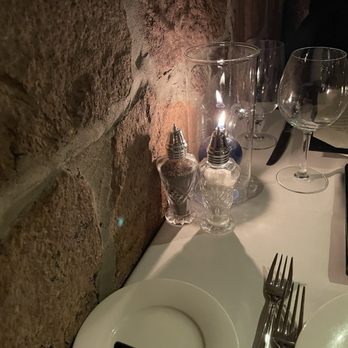 Cordeiro's Steakhouse - The brick wall that was from the old house - Seafood Near Me - Napa, California Cordeiro's Steakhouse - The brick wall that was from the old house - Seafood Near Me - Napa, California
