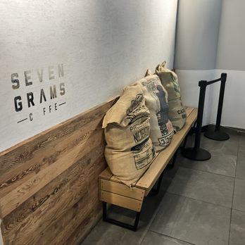 Seven Grams Caffe - Entrance with coffee sacks - Coffee & Tea Near Me - New York, New York Seven Grams Caffe - Entrance with coffee sacks - Coffee & Tea Near Me - New York, New York